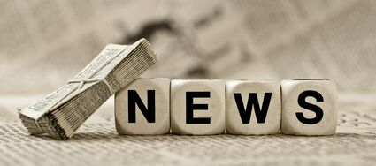 Würfel, auf denen News steht