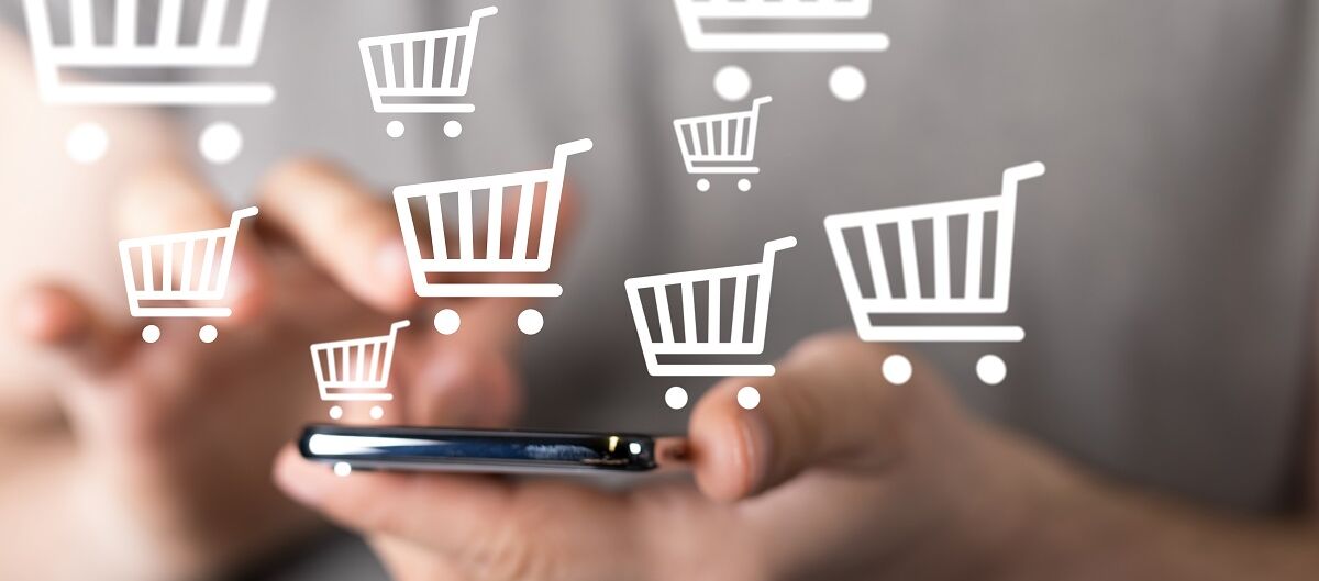 Illustration Mann mit Handy shoppt online